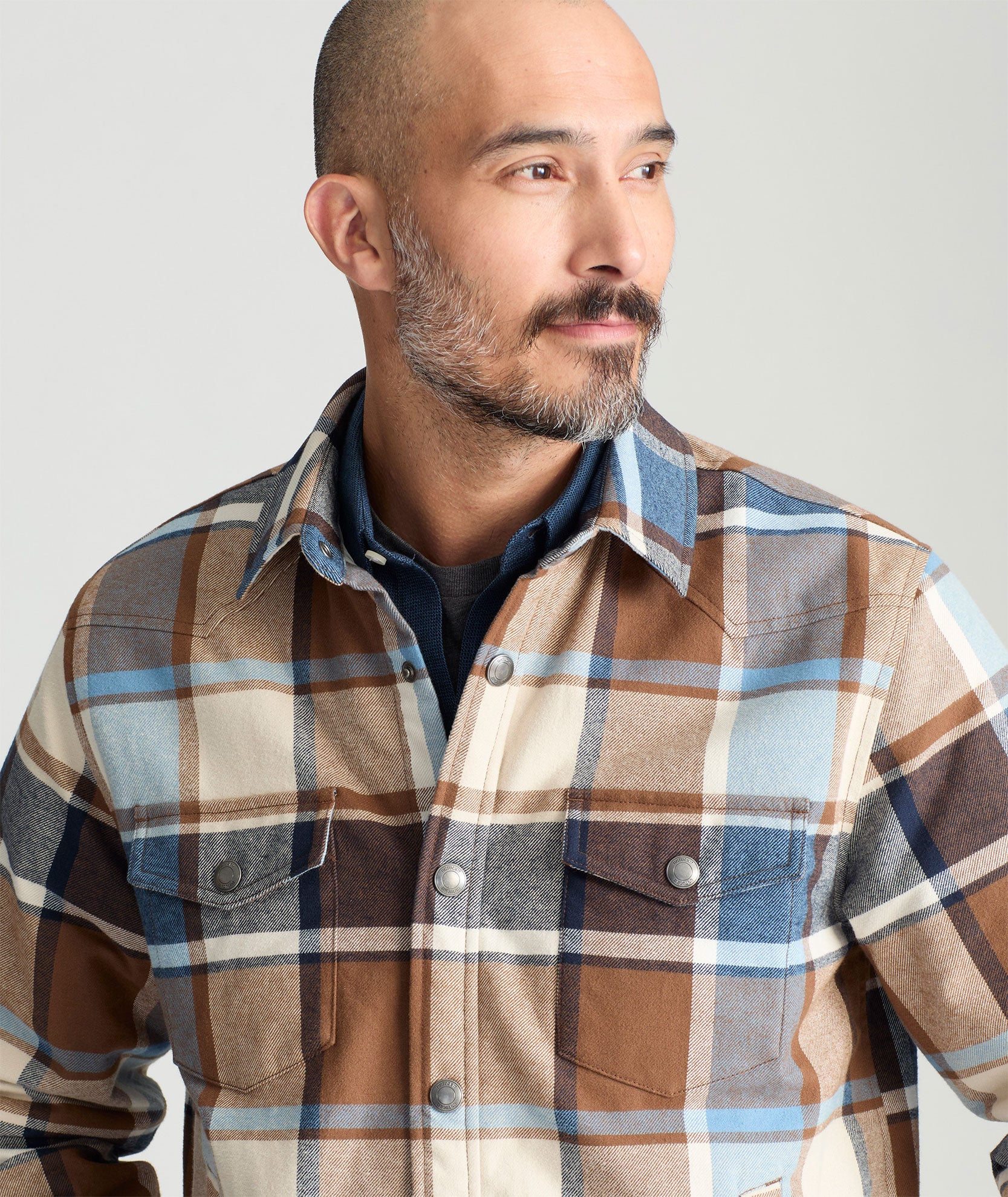 Model is wearing UNTUCKit Dimaggio western shirt jacket.