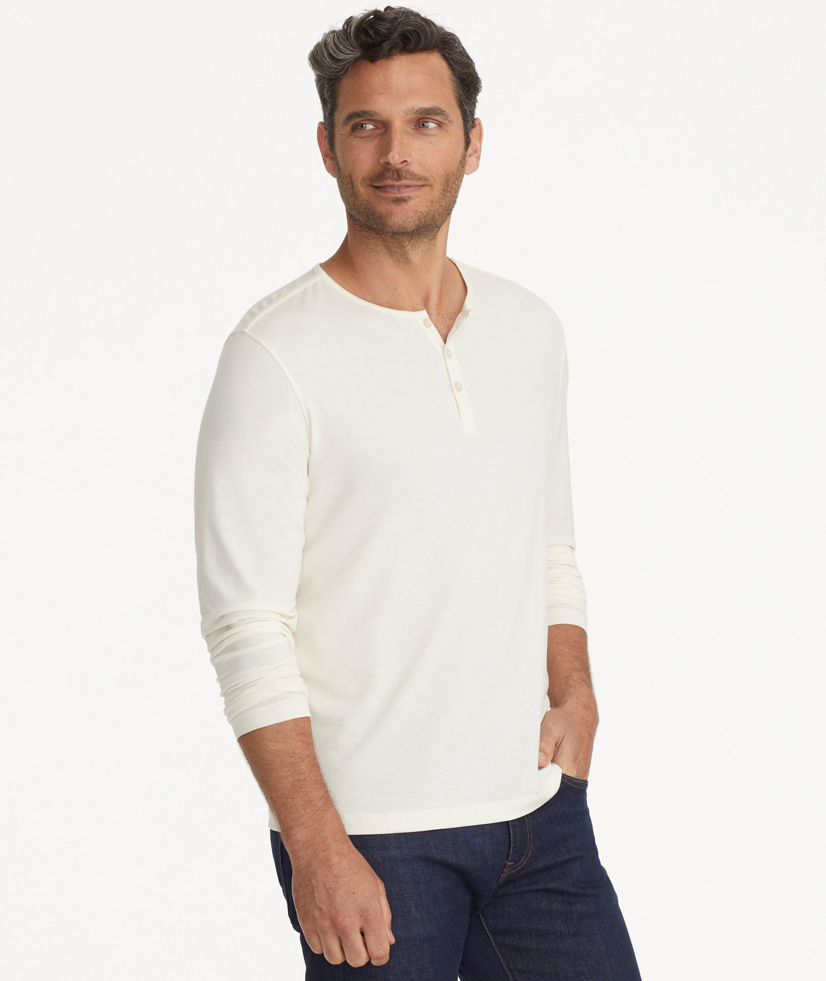 Model is wearing UNTUCKit Marastina henley in Vanilla Ice.