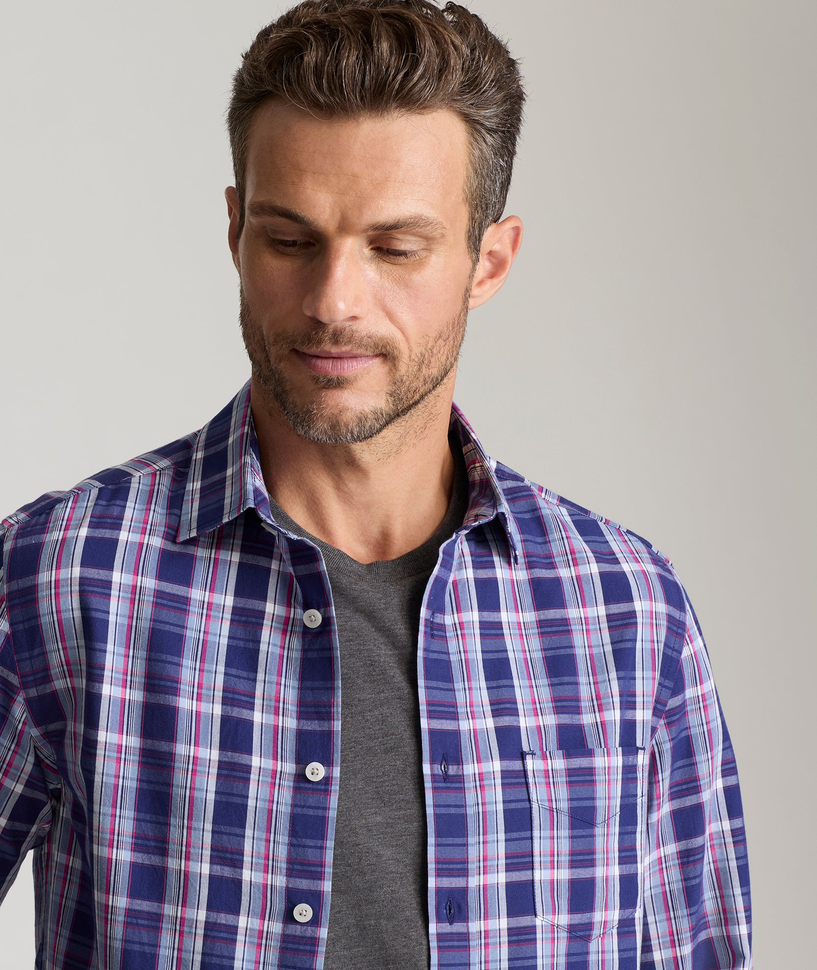 Model is wearing UNTUCKit Medoc in summer plaid. 