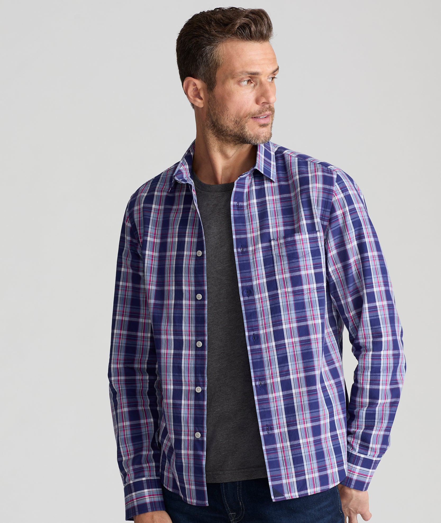 Model is wearing UNTUCKit Medoc in summer plaid. 